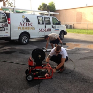 Aztec Plumbers performing drain work