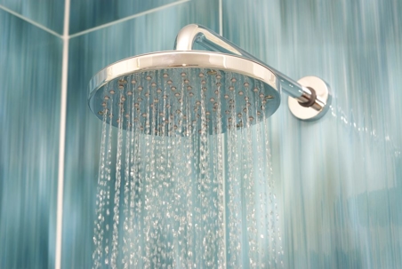 modern shower head running water